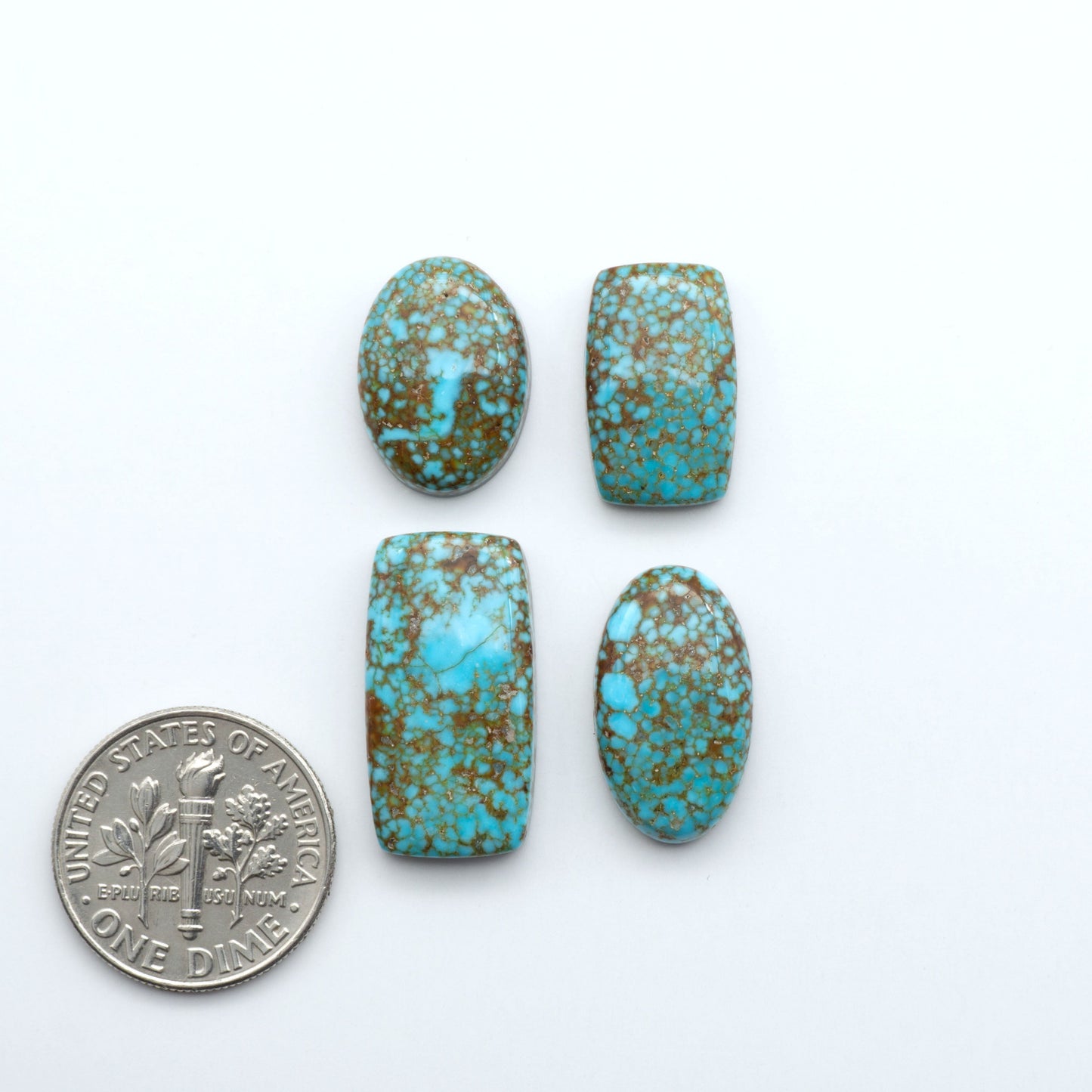 Kingman Turquoise Cabochons are a staple in the jewelry industry, known for their stunning blue-green color. Perfect for necklaces, earrings, and more!