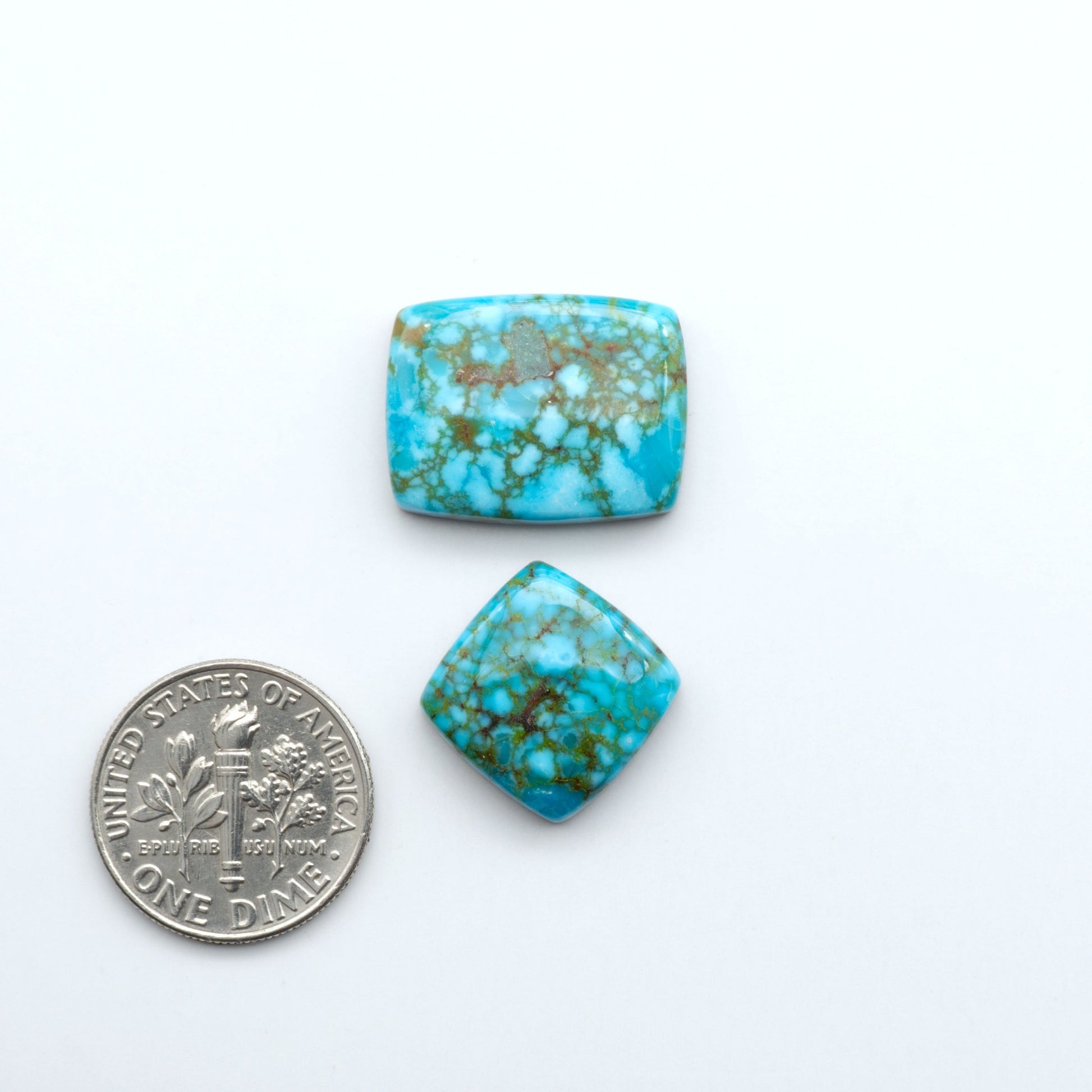 Kingman Turquoise Cabochons are a staple in the jewelry industry, known for their stunning blue-green color. Perfect for necklaces, earrings, and more!