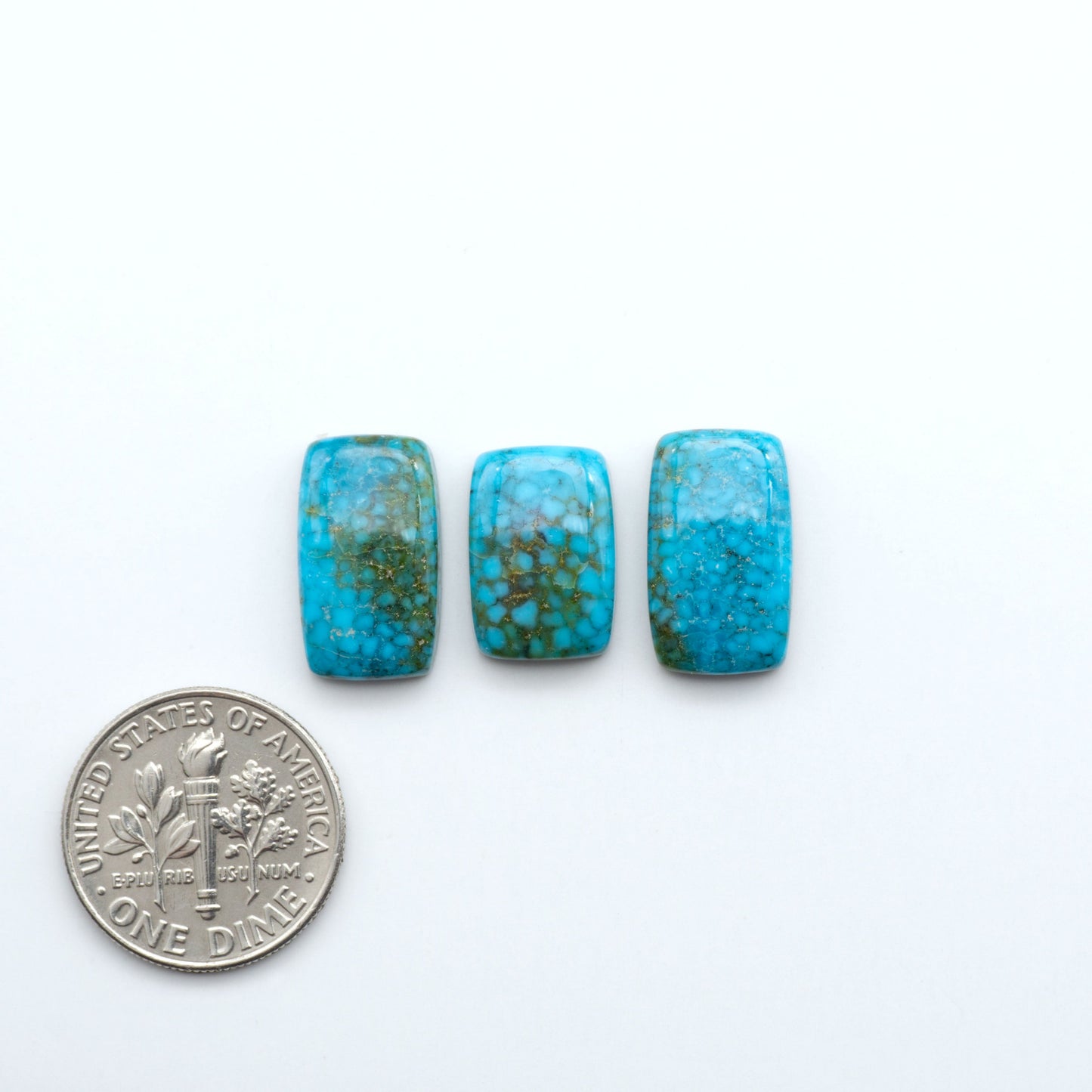 Kingman Turquoise Cabochons are a staple in the jewelry industry, known for their stunning blue-green color. Perfect for necklaces, earrings, and more!