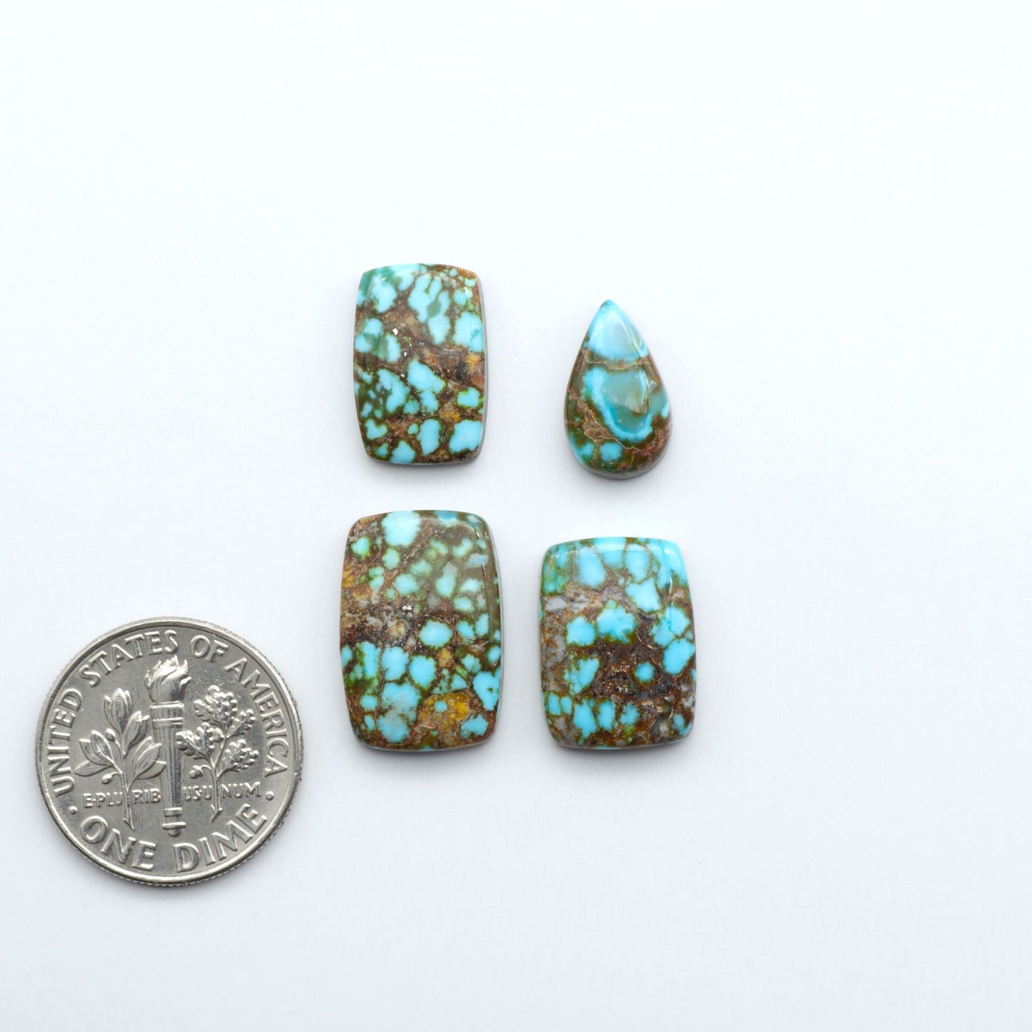 Kingman Turquoise Cabochons are a staple in the jewelry industry, known for their stunning blue-green color. Perfect for necklaces, earrings, and more!