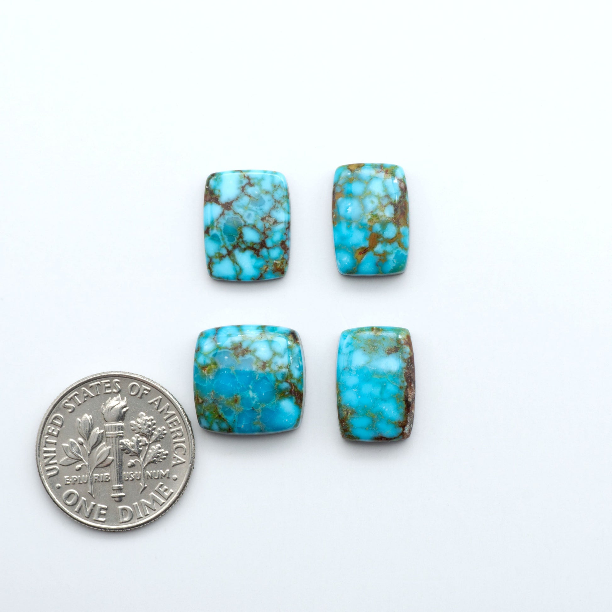Kingman Turquoise Cabochons are a staple in the jewelry industry, known for their stunning blue-green color. Perfect for necklaces, earrings, and more!
