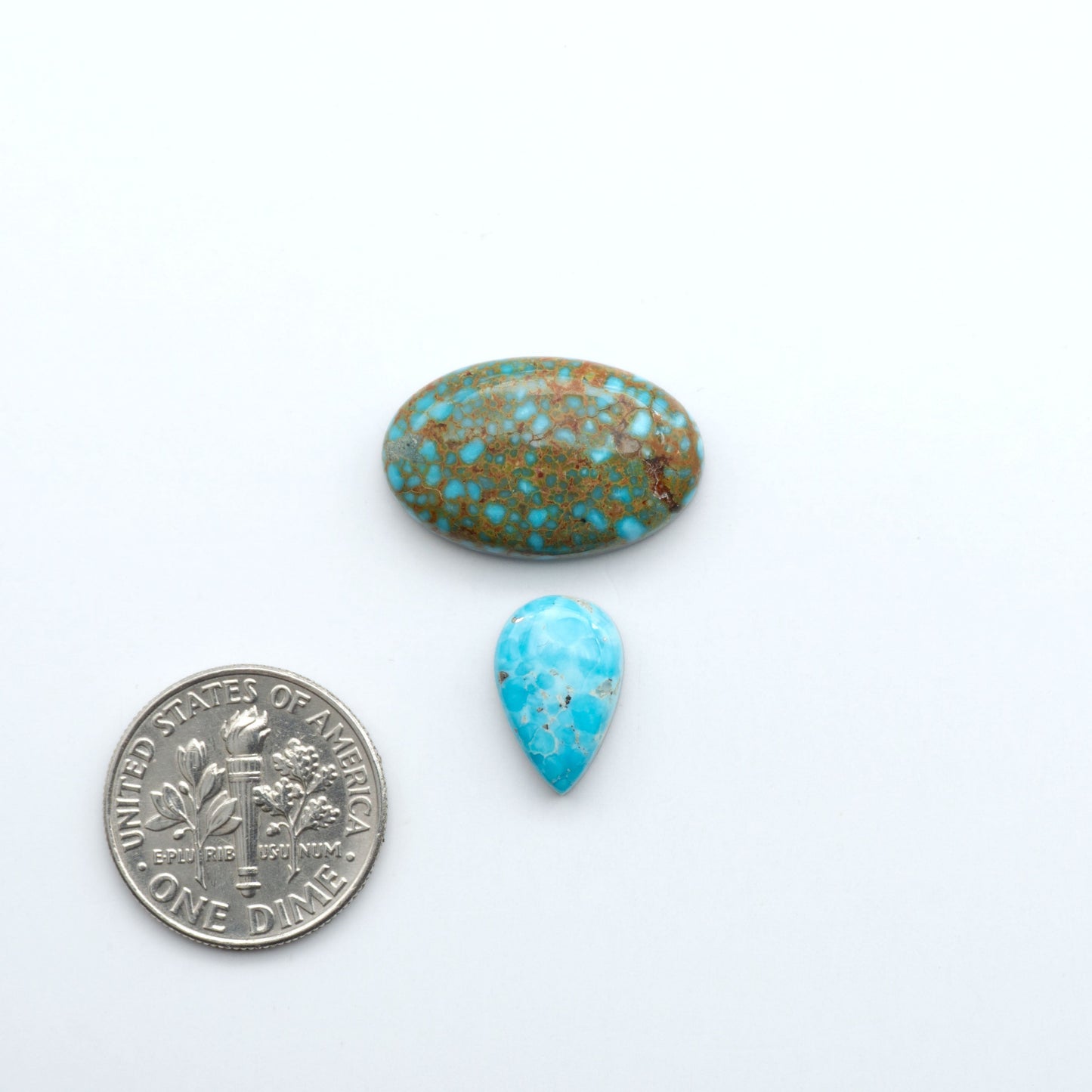 Kingman Turquoise Cabochons are a staple in the jewelry industry, known for their stunning blue-green color. Perfect for necklaces, earrings, and more!
