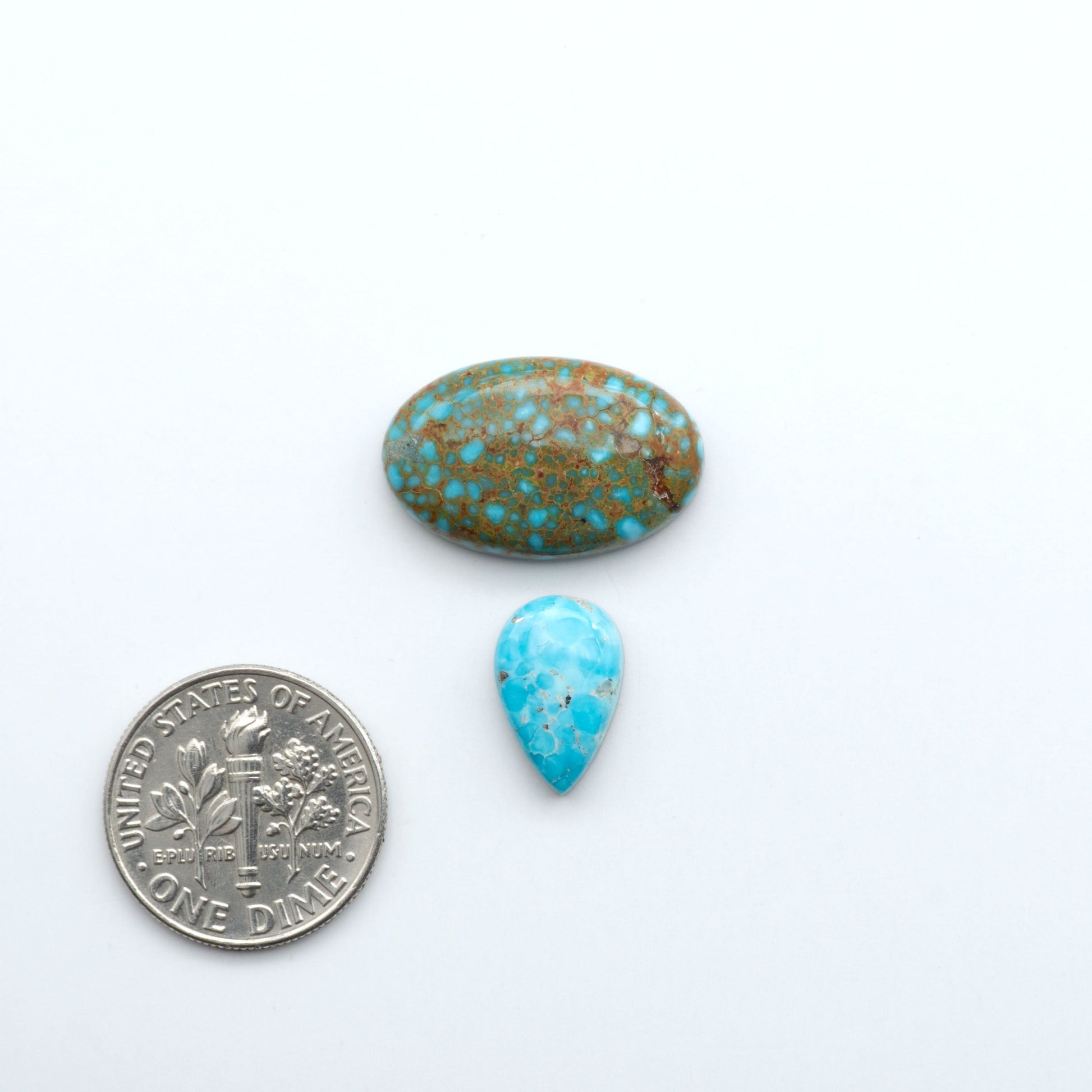 Kingman Turquoise Cabochons are a staple in the jewelry industry, known for their stunning blue-green color. Perfect for necklaces, earrings, and more!