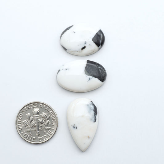 Natural White Buffalo Stone Cabochons are semi-precious gemstones cut into shapes ideal for jewelry-making, making them an excellent choice for artisans.

