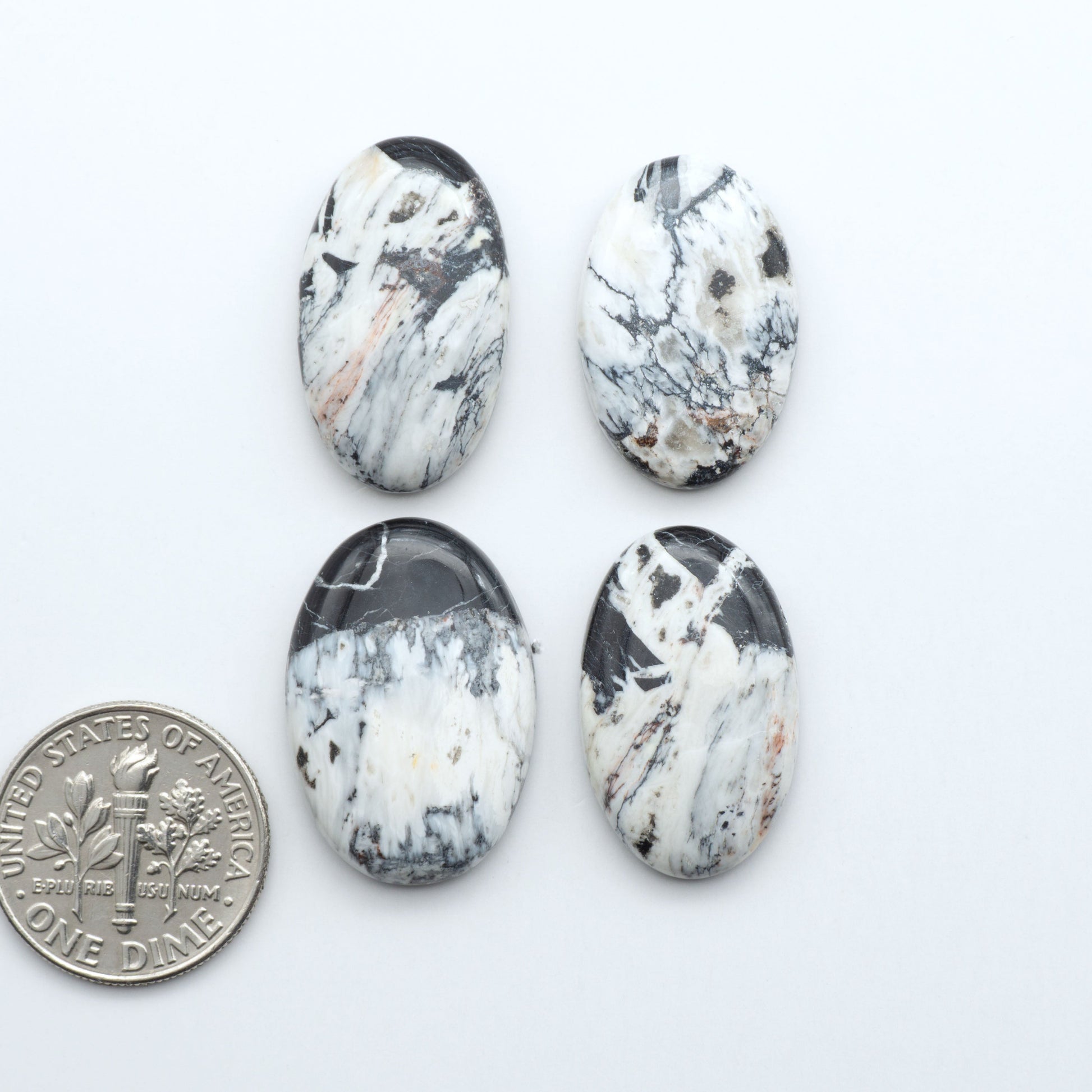 Natural White Buffalo Stone Cabochons are semi-precious gemstones cut into shapes ideal for jewelry-making, making them an excellent choice for artisans.

