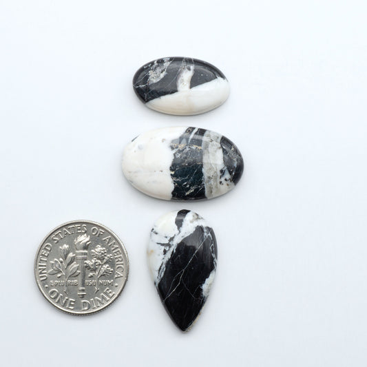 Natural White Buffalo Stone Cabochons are semi-precious gemstones cut into shapes ideal for jewelry-making, making them an excellent choice for artisans.

