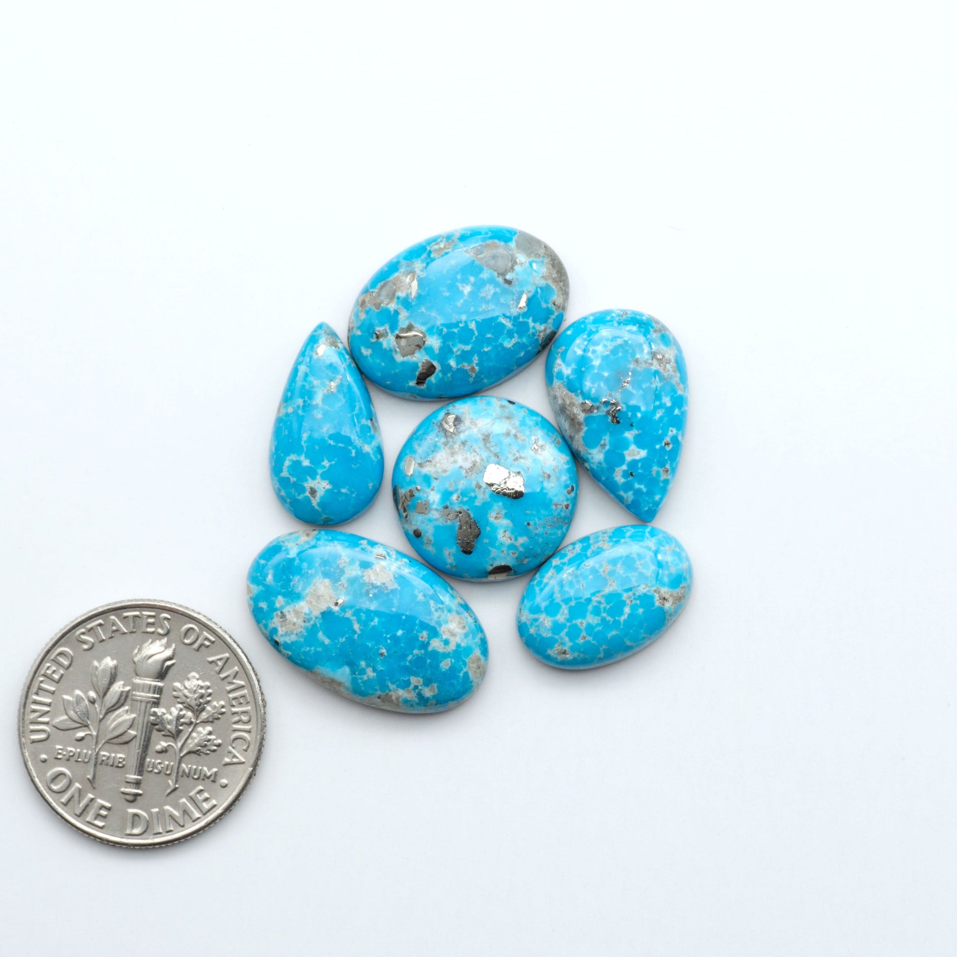 Create stunning handcrafted jewelry with Blue Bird Turquoise Cabochons. Their rich blue color and polish make them perfect for silversmiths and jewelry makers.