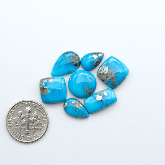 Create stunning handcrafted jewelry with Blue Bird Turquoise Cabochons. Their rich blue color and polish make them perfect for silversmiths and jewelry makers.