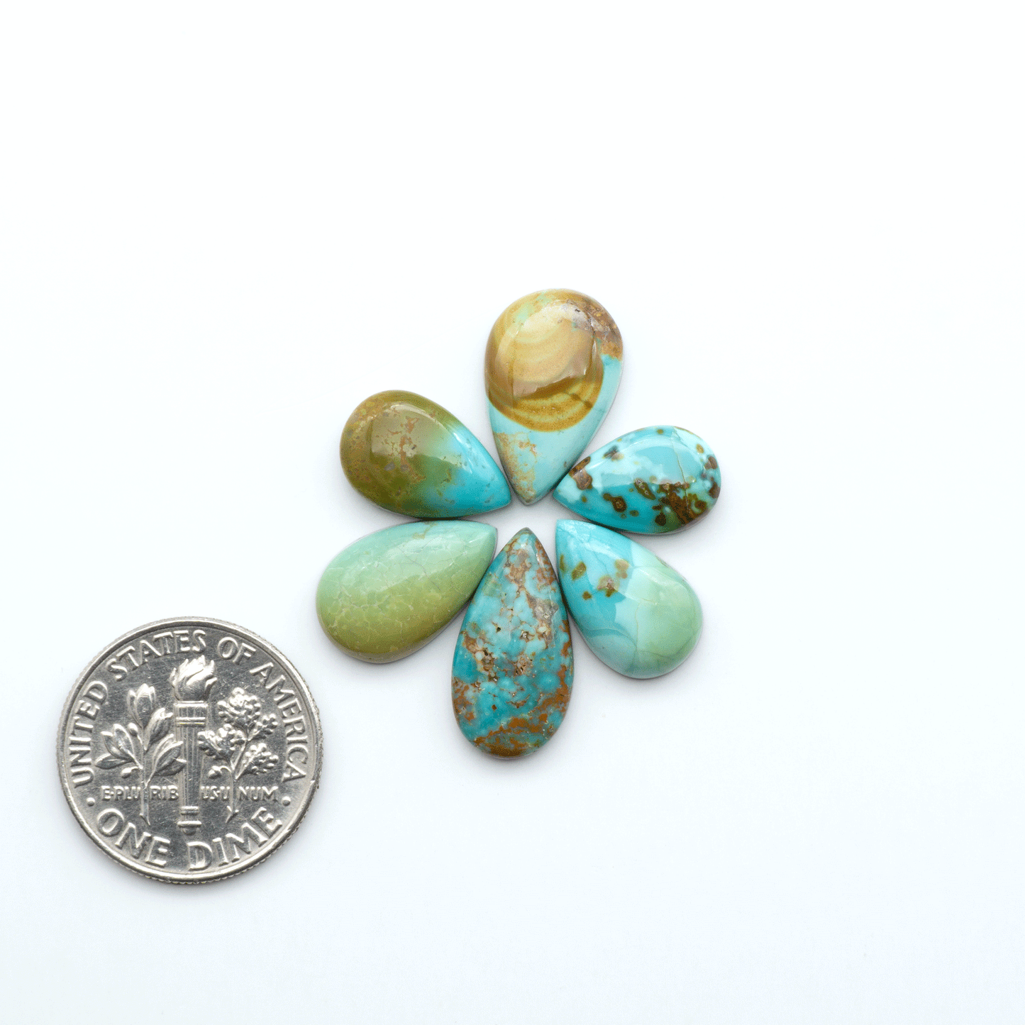 Add a touch of beauty to your collection with our stunning Pilot Mountain Turquoise Cabochons. Perfect for jewelry making each piece is truly one-of-a-kind.