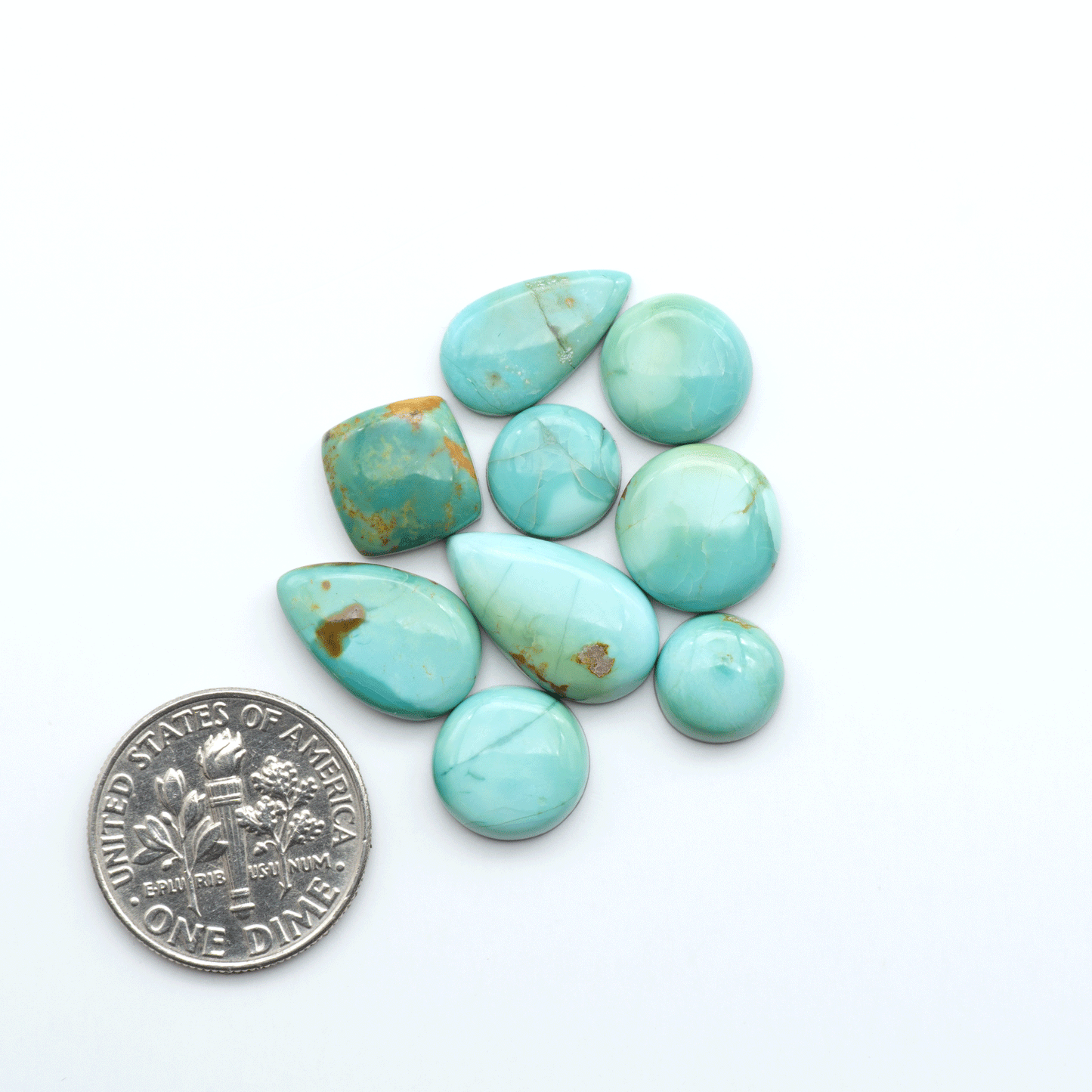 Add a touch of beauty to your collection with our stunning Pilot Mountain Turquoise Cabochons. Perfect for jewelry making each piece is truly one-of-a-kind.