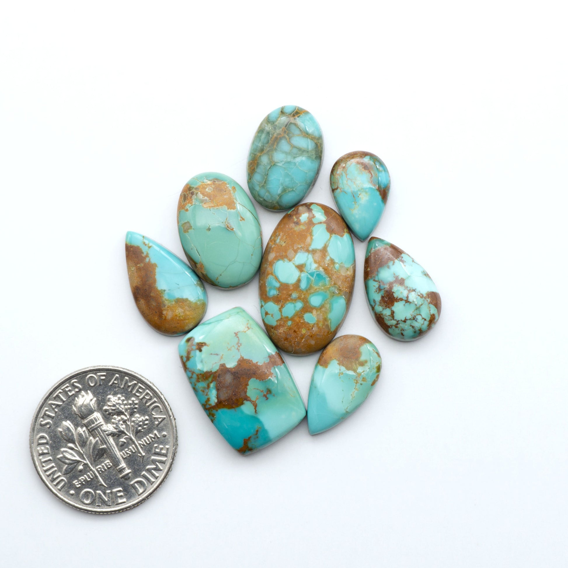 Add a touch of beauty to your collection with our stunning Pilot Mountain Turquoise Cabochons. Perfect for jewelry making each piece is truly one-of-a-kind.