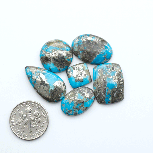 Nacozari turquoise cabochons are striking gemstones known for their vibrant blue to greenish-blue colors and pyrite, these stones are prized in jewelry making.