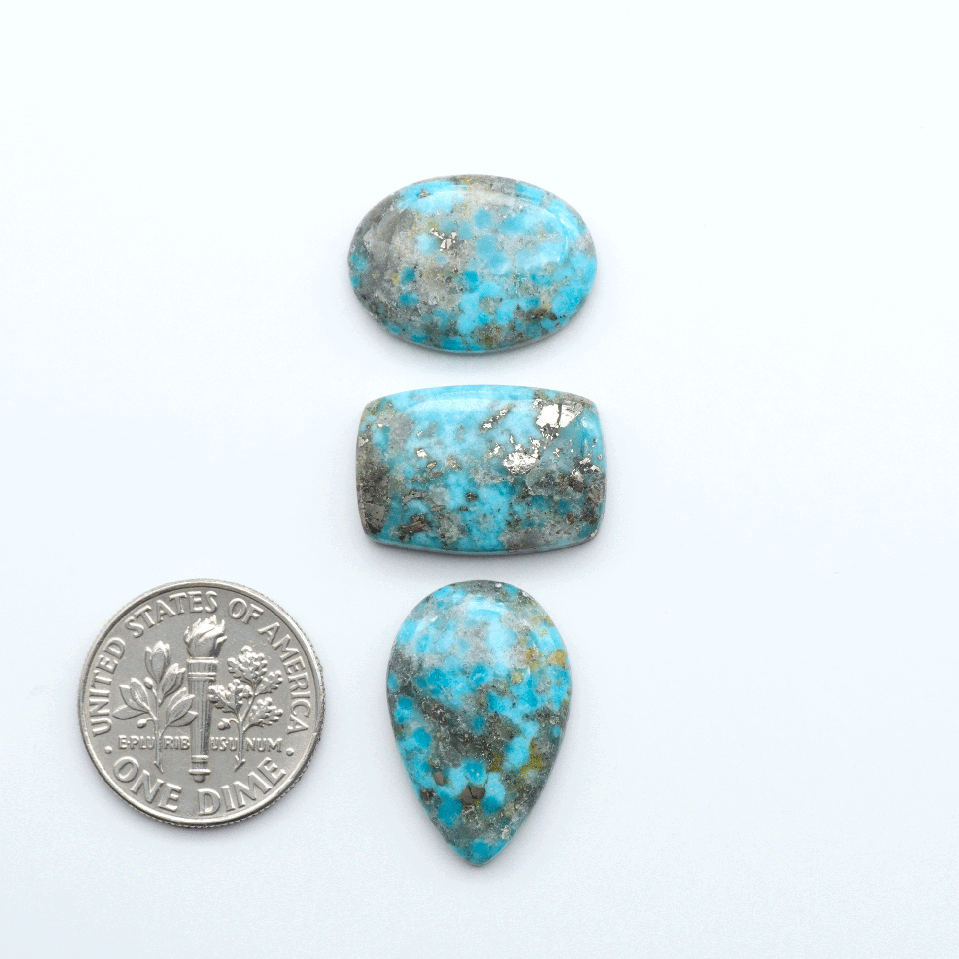 Nacozari turquoise cabochons are striking gemstones known for their vibrant blue to greenish-blue colors and pyrite, these stones are prized in jewelry making.