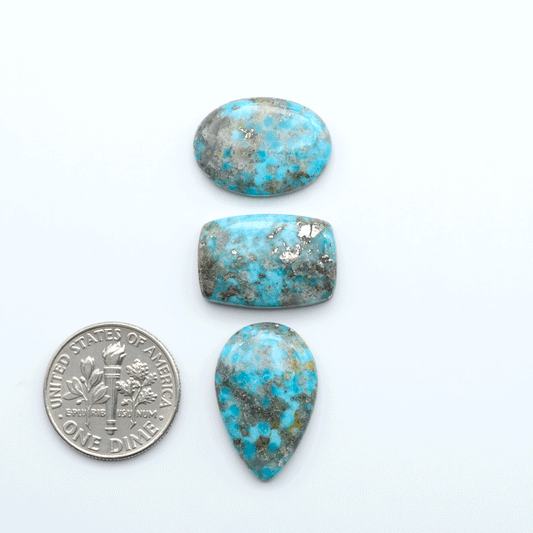 Nacozari turquoise cabochons are striking gemstones known for their vibrant blue to greenish-blue colors and pyrite, these stones are prized in jewelry making.