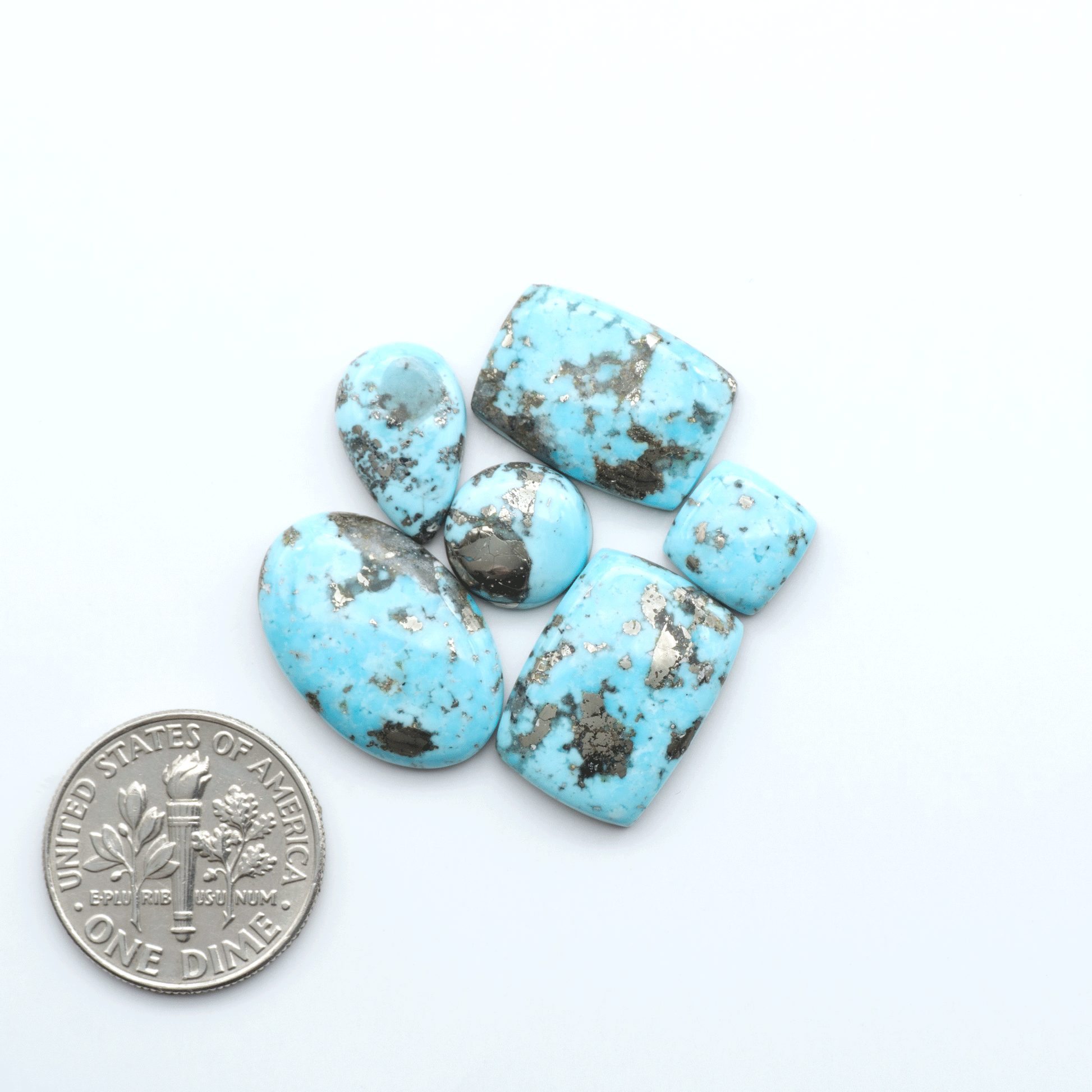 Nacozari turquoise cabochons are striking gemstones known for their vibrant blue to greenish-blue colors and pyrite, these stones are prized in jewelry making.