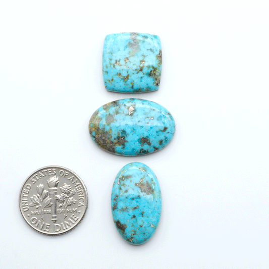 Nacozari turquoise cabochons are striking gemstones known for their vibrant blue to greenish-blue colors and pyrite, these stones are prized in jewelry making.