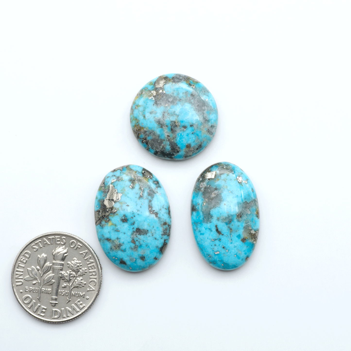 Nacozari turquoise cabochons are striking gemstones known for their vibrant blue to greenish-blue colors and pyrite, these stones are prized in jewelry making.