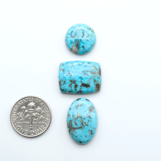 Nacozari turquoise cabochons are striking gemstones known for their vibrant blue to greenish-blue colors and pyrite, these stones are prized in jewelry making.