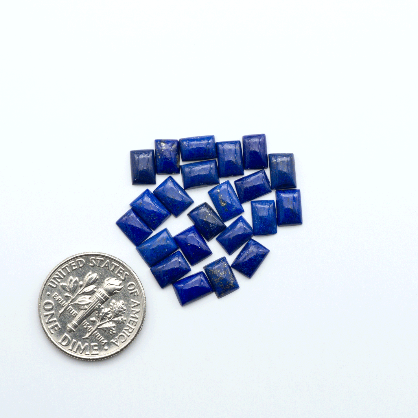Shop natural Lapis Lazuli cabochons with rich blue tones and golden pyrite, perfect for silversmiths and jewelry makers designing custom pieces.