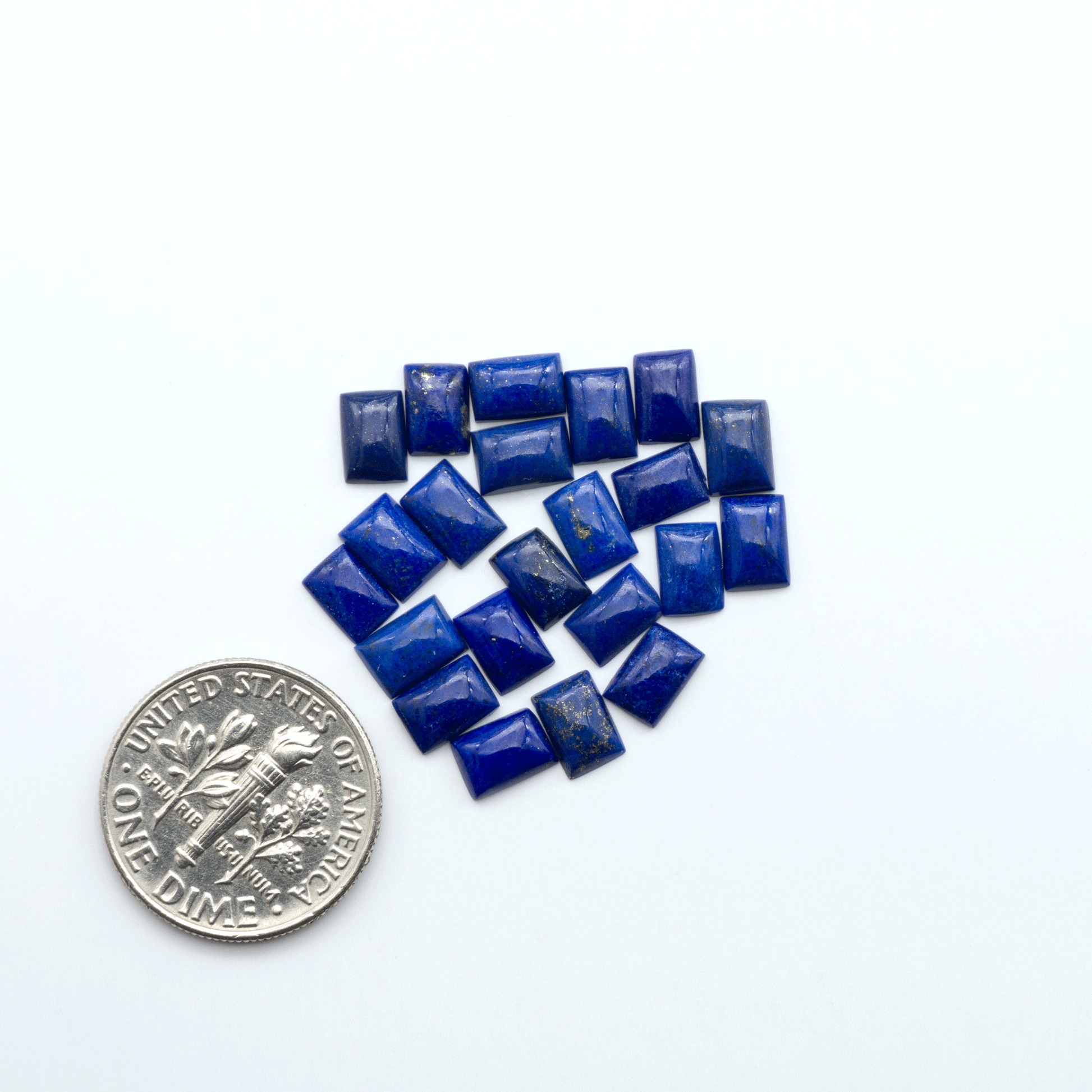 Shop natural Lapis Lazuli cabochons with rich blue tones and golden pyrite, perfect for silversmiths and jewelry makers designing custom pieces.