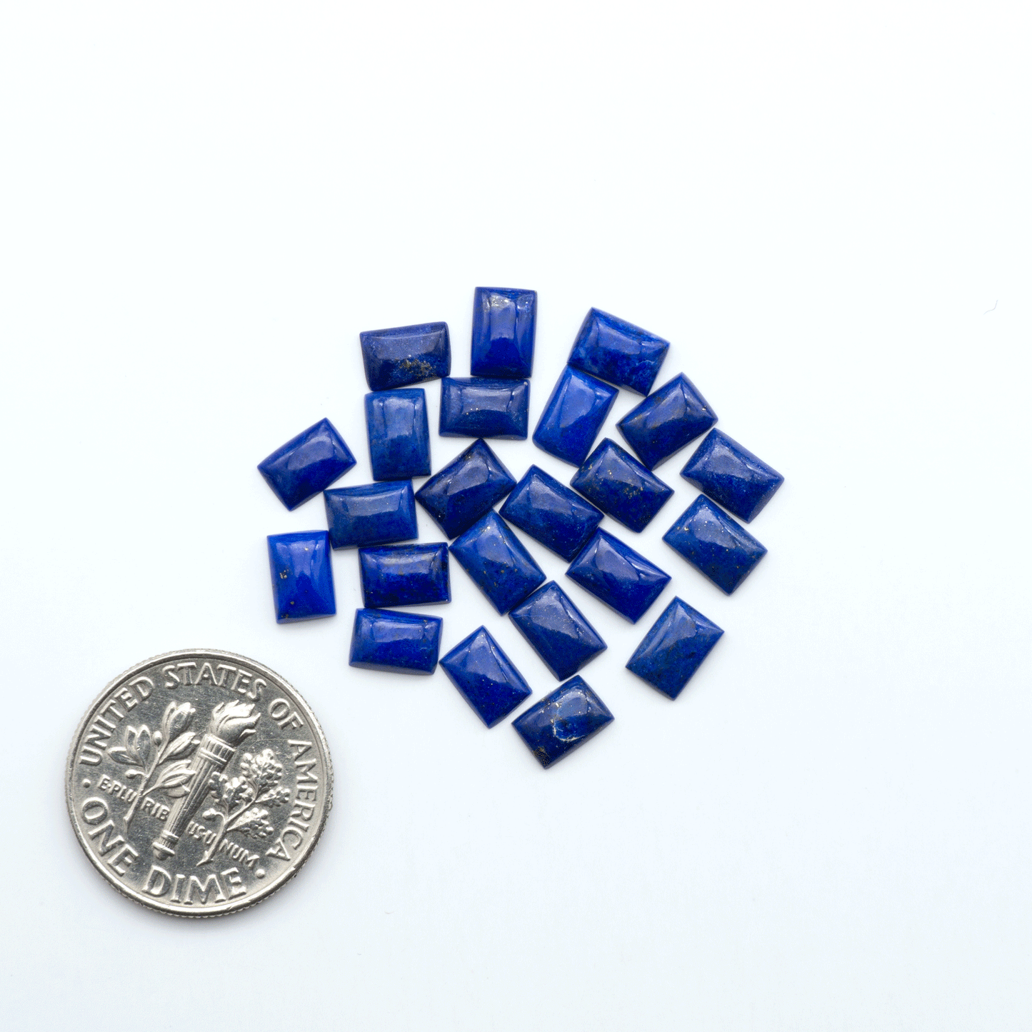 Shop natural Lapis Lazuli cabochons with rich blue tones and golden pyrite, perfect for silversmiths and jewelry makers designing custom pieces.