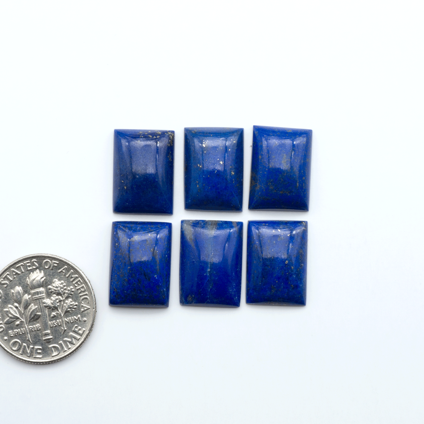 Shop natural Lapis Lazuli cabochons with rich blue tones and golden pyrite, perfect for silversmiths and jewelry makers designing custom pieces.