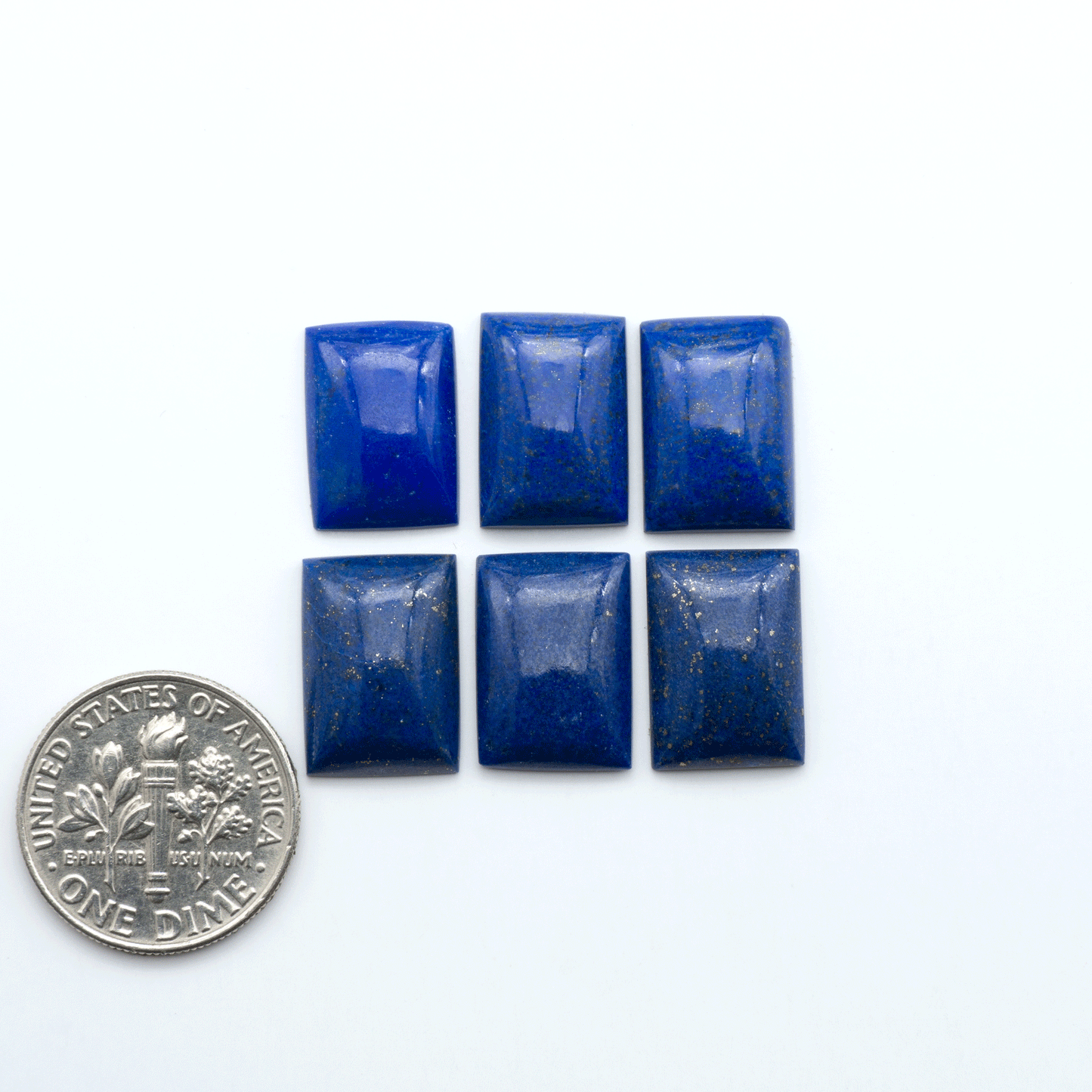 Shop natural Lapis Lazuli cabochons with rich blue tones and golden pyrite, perfect for silversmiths and jewelry makers designing custom pieces.