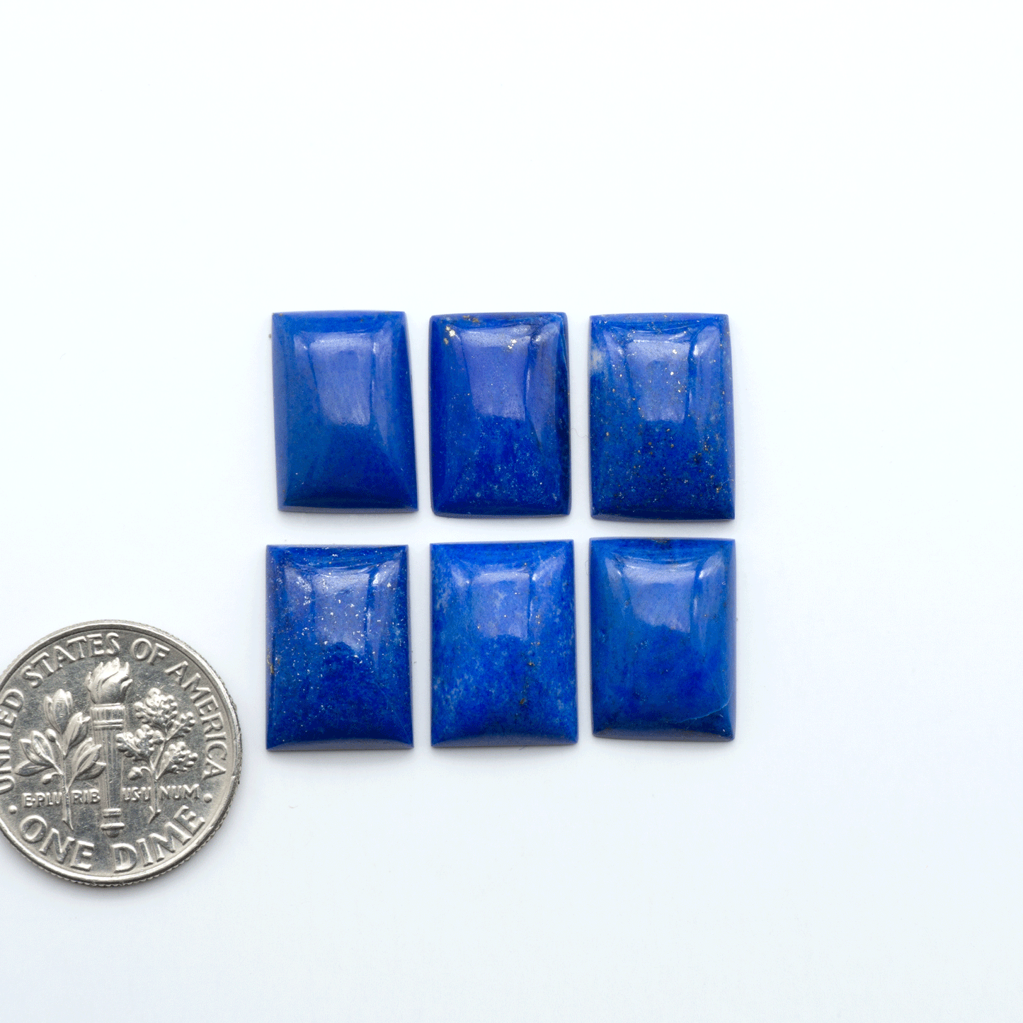 Shop natural Lapis Lazuli cabochons with rich blue tones and golden pyrite, perfect for silversmiths and jewelry makers designing custom pieces.