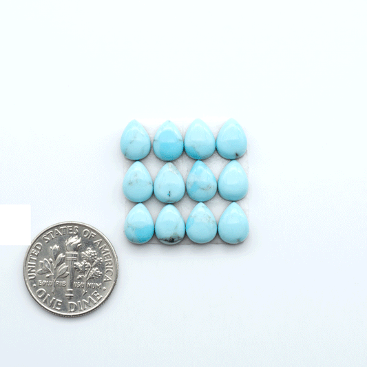 Enhance your jewelry designs with Pressed Turquoise Nugget Cabochons. Crafted from composite materials they add a captivating touch to your creations.