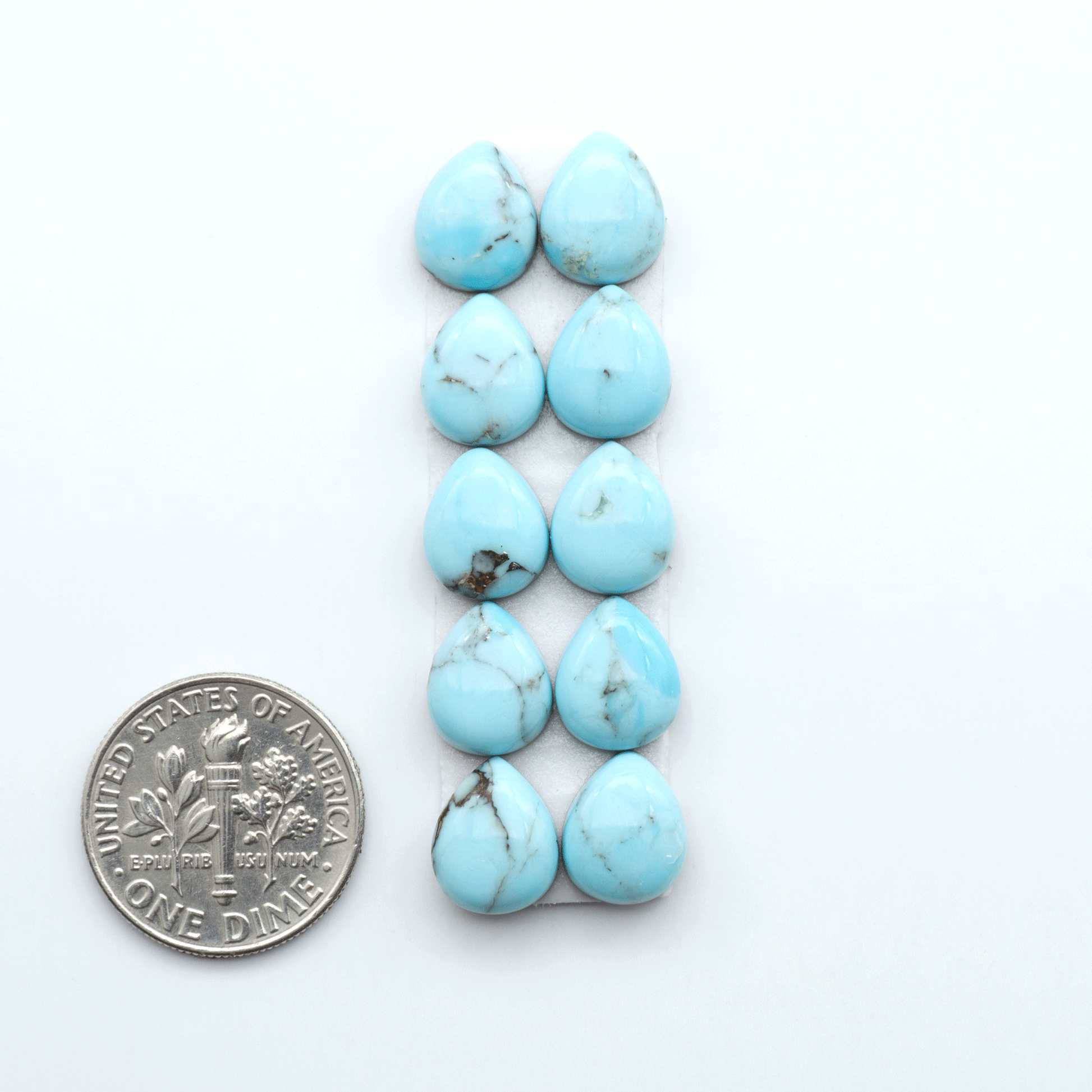 Enhance your jewelry designs with Pressed Turquoise Nugget Cabochons. Crafted from composite materials they add a captivating touch to your creations.