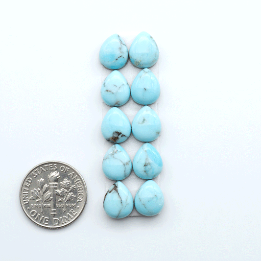 Enhance your jewelry designs with Pressed Turquoise Nugget Cabochons. Crafted from composite materials they add a captivating touch to your creations.