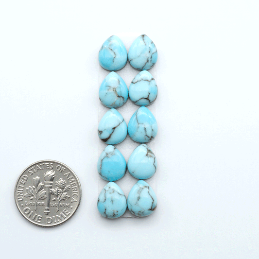 Enhance your jewelry designs with Pressed Turquoise Nugget Cabochons. Crafted from composite materials they add a captivating touch to your creations.