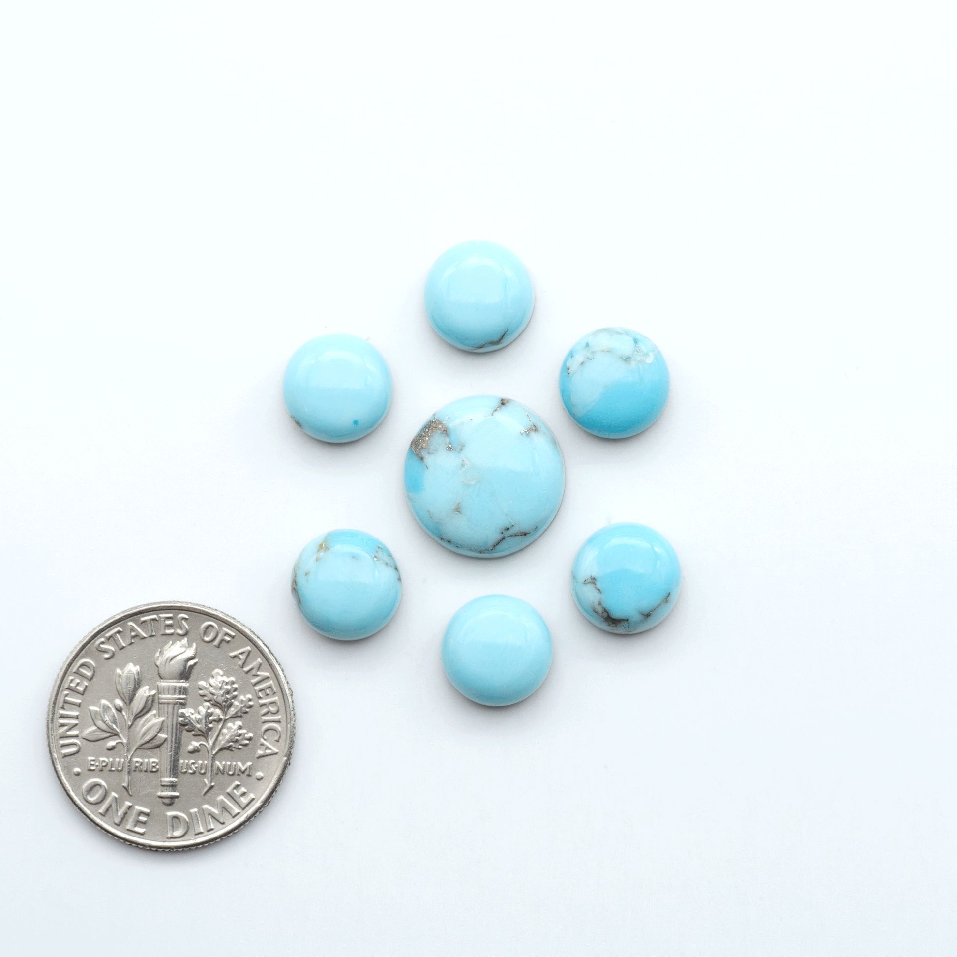 Enhance your jewelry designs with Pressed Turquoise Nugget Cabochons. Crafted from composite materials they add a captivating touch to your creations.