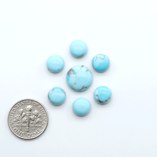 Enhance your jewelry designs with Pressed Turquoise Nugget Cabochons. Crafted from composite materials they add a captivating touch to your creations.