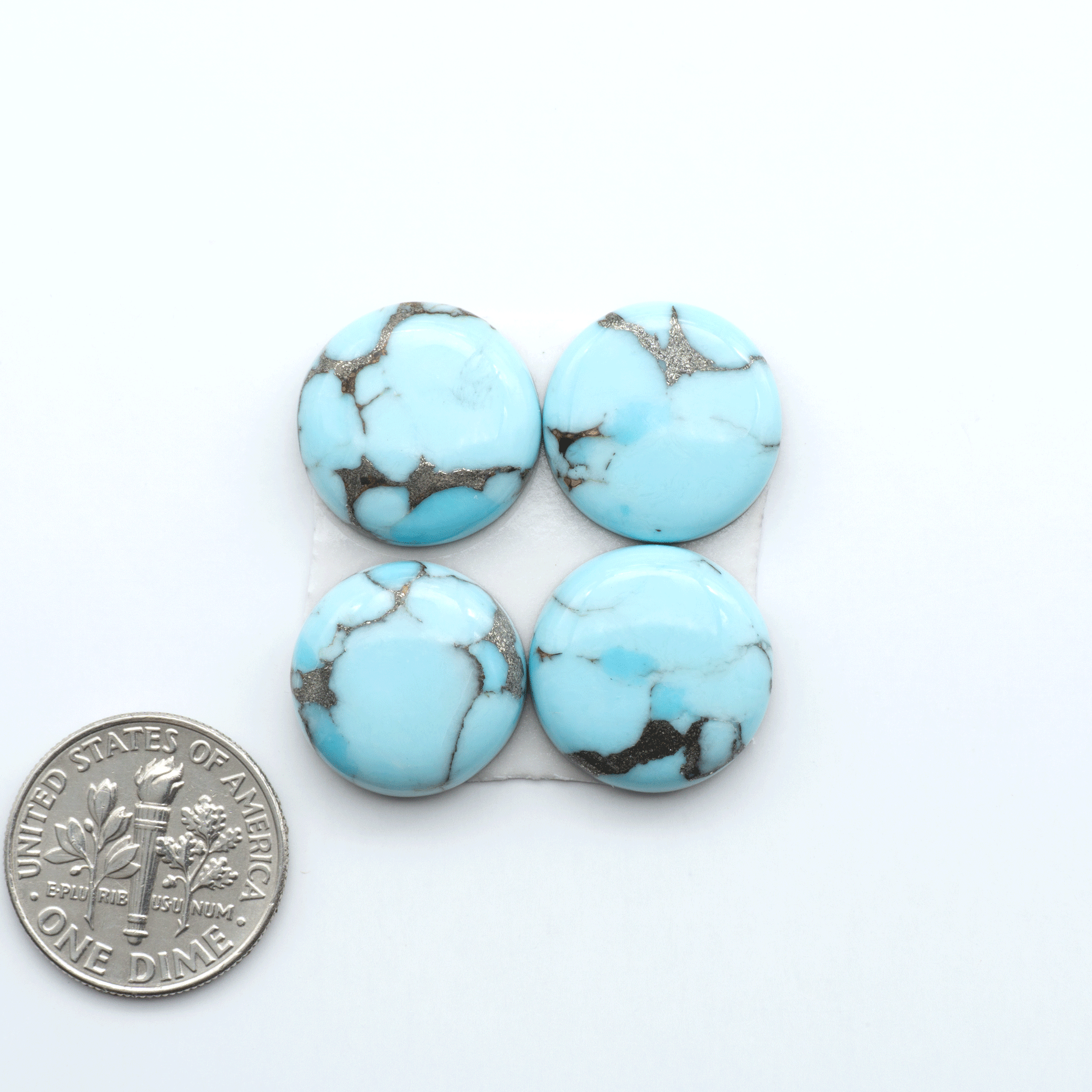 Enhance your jewelry designs with Pressed Turquoise Nugget Cabochons. Crafted from composite materials they add a captivating touch to your creations.