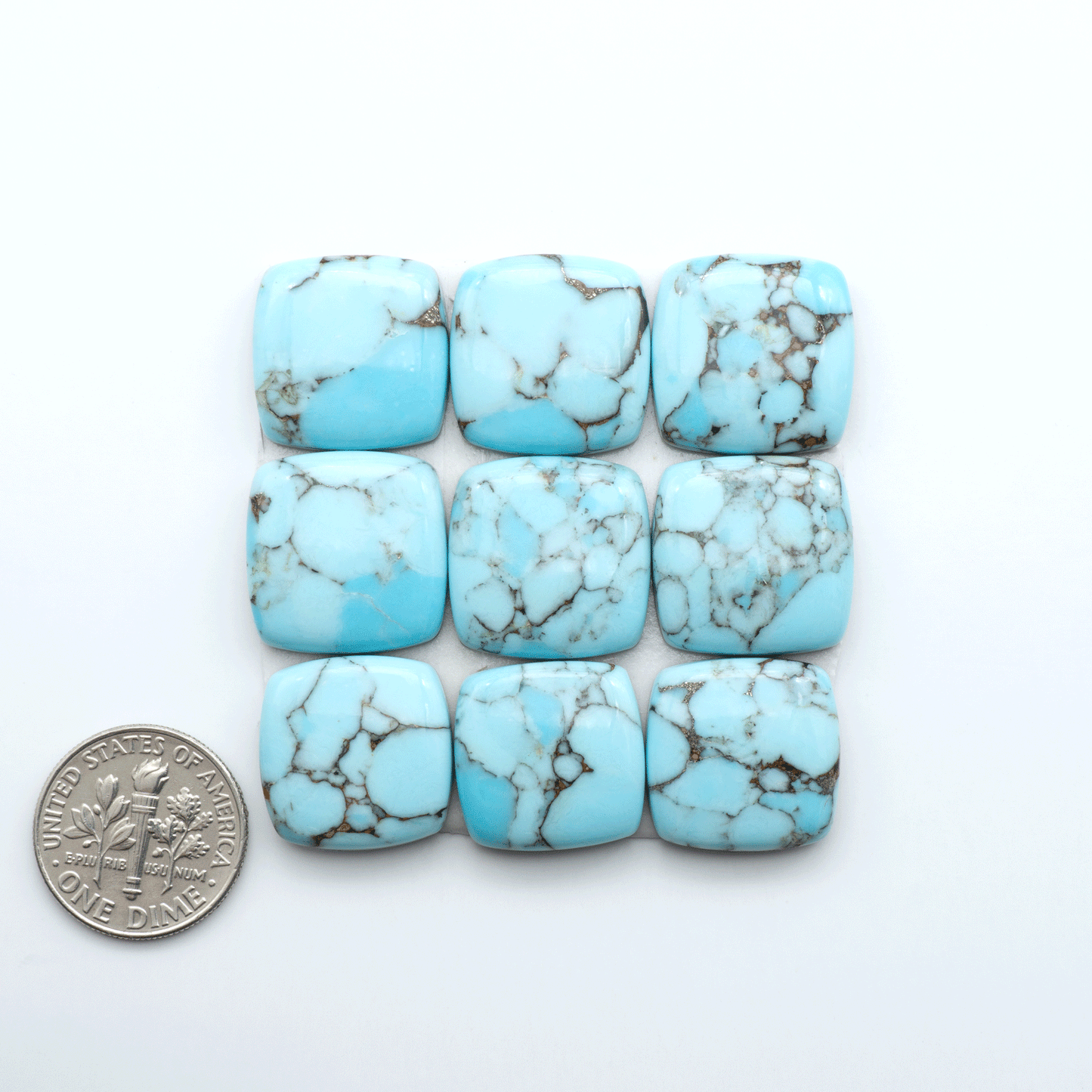 Enhance your jewelry designs with Pressed Turquoise Nugget Cabochons. Crafted from composite materials they add a captivating touch to your creations.