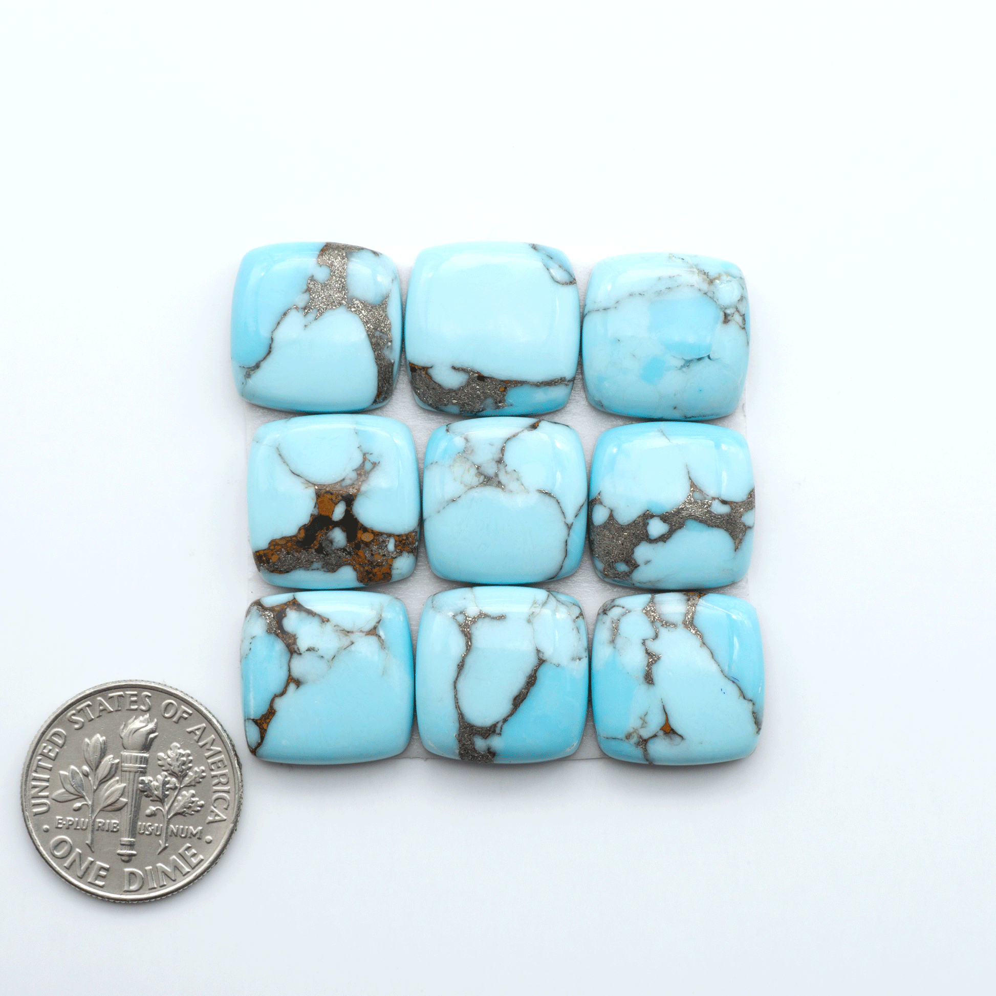Enhance your jewelry designs with Pressed Turquoise Nugget Cabochons. Crafted from composite materials they add a captivating touch to your creations.