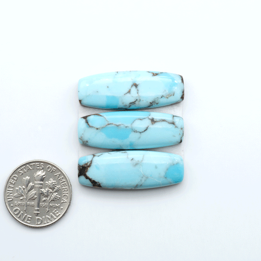 Enhance your jewelry designs with Pressed Turquoise Nugget Cabochons. Crafted from composite materials they add a captivating touch to your creations.
