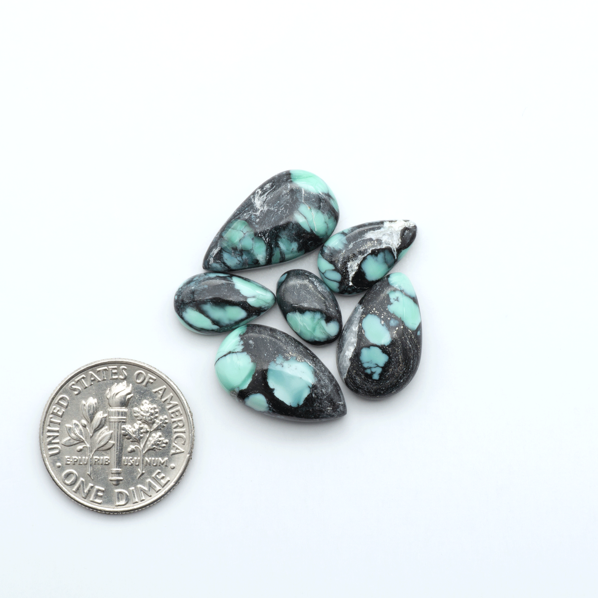 Shop Variscite cabochons with natural matrix patterns, ideal for silversmiths and jewelry makers creating custom rings and pendants.