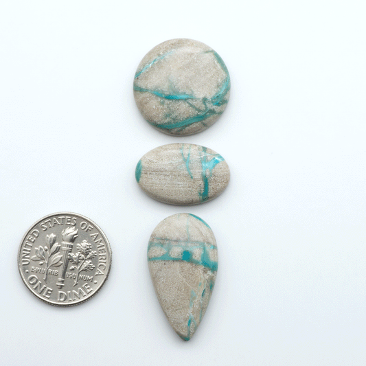 Carico Lake Turquoise cabochons with vibrant aqua-blue to turquoise tones and natural matrix, ideal for rings, pendants, and artisan jewelry.