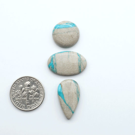 Carico Lake Turquoise cabochons with vibrant aqua-blue to turquoise tones and natural matrix, ideal for rings, pendants, and artisan jewelry.