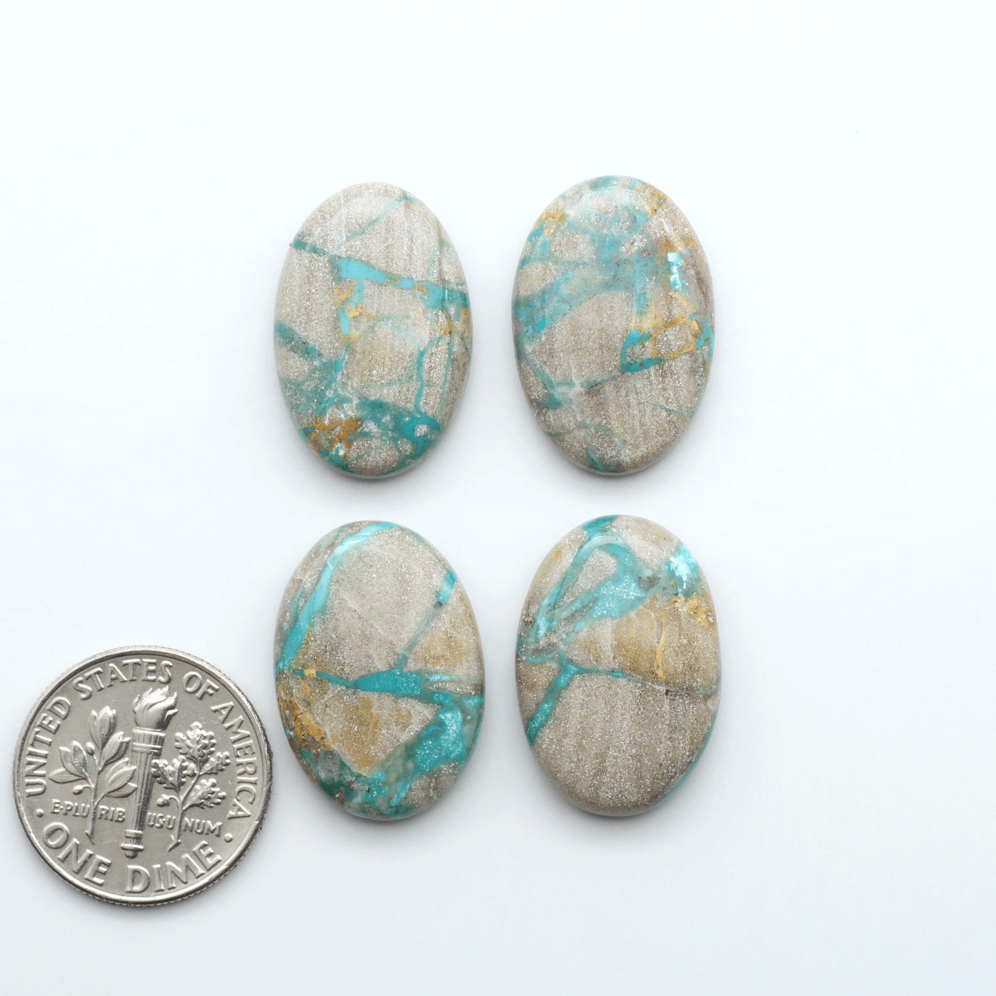 Carico Lake Turquoise cabochons with vibrant aqua-blue to turquoise tones and natural matrix, ideal for rings, pendants, and artisan jewelry.