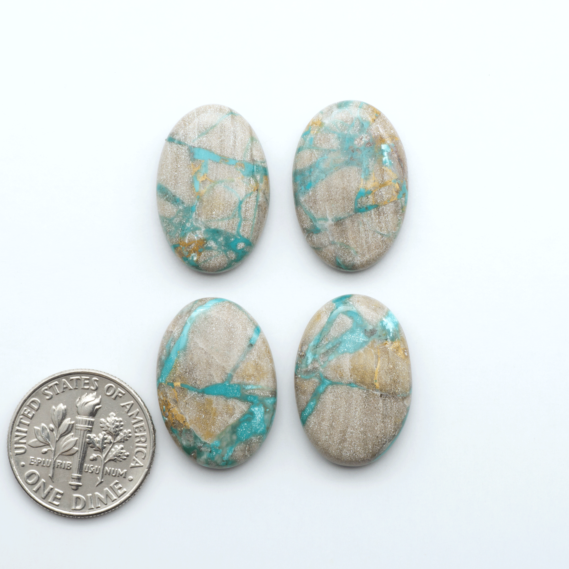 Carico Lake Turquoise cabochons with vibrant aqua-blue to turquoise tones and natural matrix, ideal for rings, pendants, and artisan jewelry.