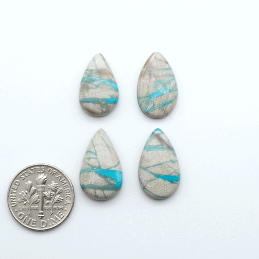 Carico Lake Turquoise cabochons with vibrant aqua-blue to turquoise tones and natural matrix, ideal for rings, pendants, and artisan jewelry.