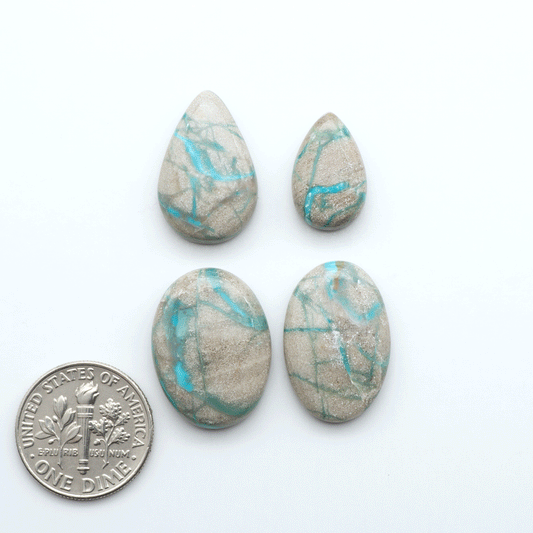 Carico Lake Turquoise cabochons with vibrant aqua-blue to turquoise tones and natural matrix, ideal for rings, pendants, and artisan jewelry.