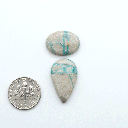 Carico Lake Turquoise cabochons with vibrant aqua-blue to turquoise tones and natural matrix, ideal for rings, pendants, and artisan jewelry.