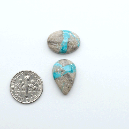 Carico Lake Turquoise cabochons with vibrant aqua-blue to turquoise tones and natural matrix, ideal for rings, pendants, and artisan jewelry.