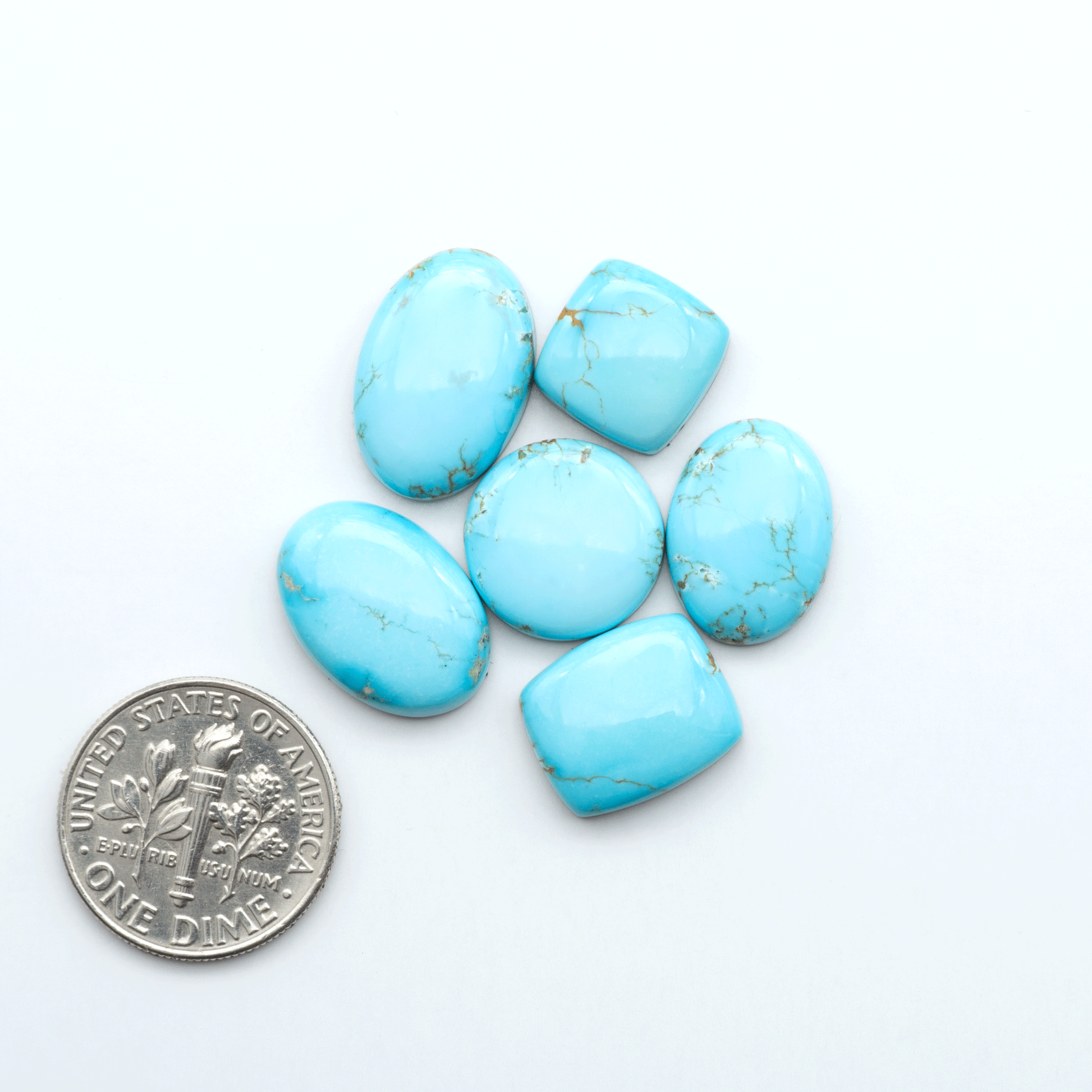 Sierra Bella Turquoise cabochons feature rich blue-green color and natural matrix variation. Ideal for silversmiths, jewelers, and custom jewelry designs.