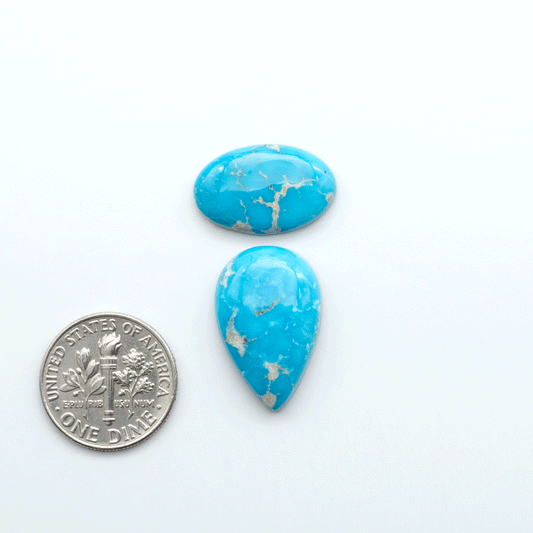 Sierra Bella Turquoise cabochons feature rich blue-green color and natural matrix variation. Ideal for silversmiths, jewelers, and custom jewelry designs.