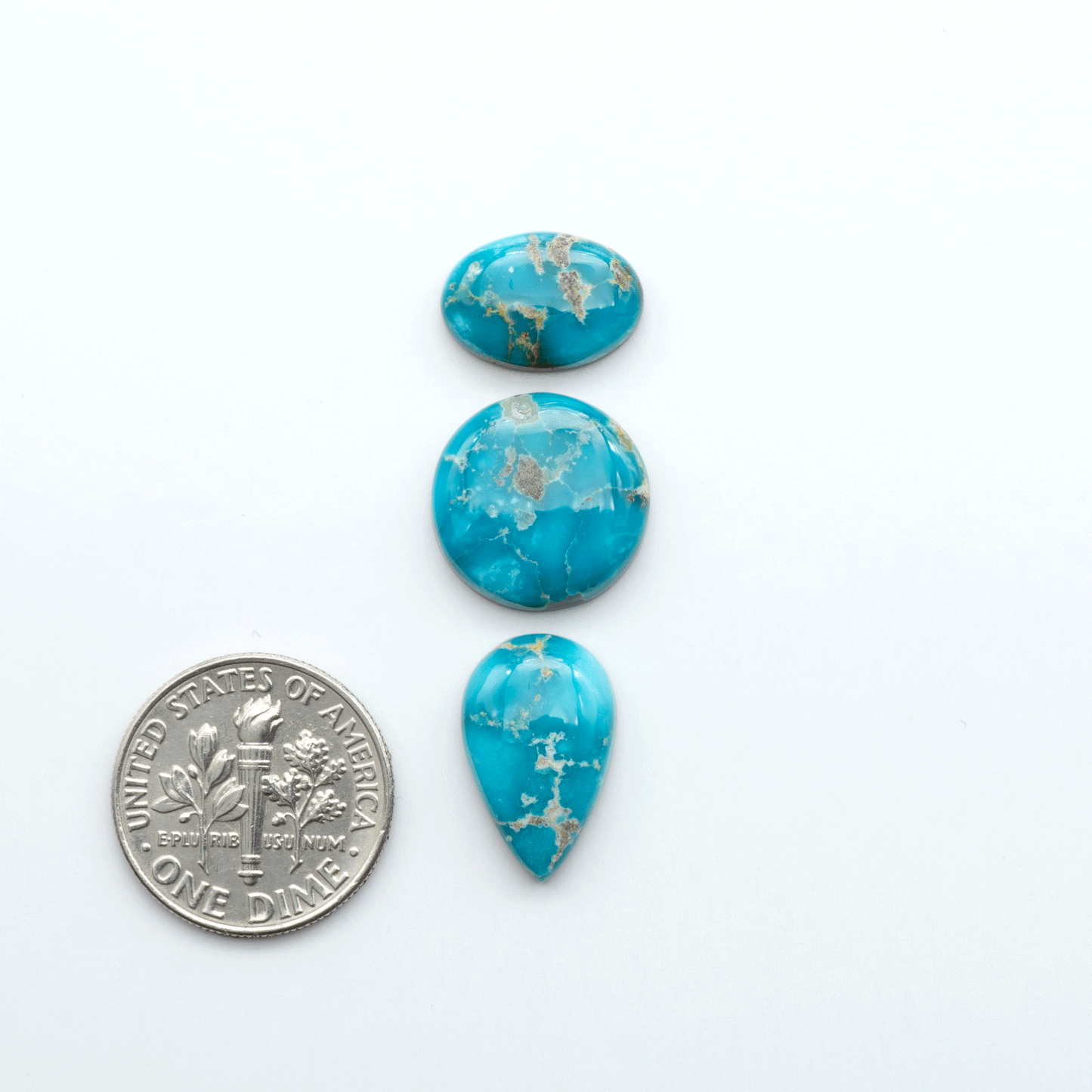 Sierra Bella Turquoise cabochons feature rich blue-green color and natural matrix variation. Ideal for silversmiths, jewelers, and custom jewelry designs.